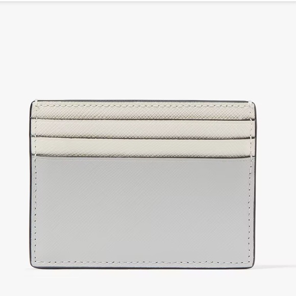Kate Spade Madison Small Slim Card Holder
Platinum Grey Multi
NWT - Picture 3 of 16